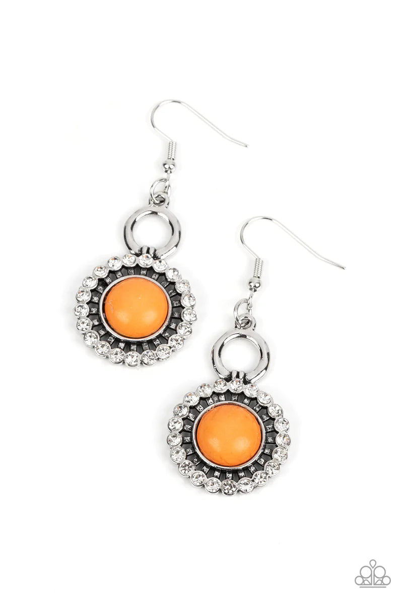 Paparazzi Accessories Mojave Mogul - Orange Attached to rustic silver prongs, a dainty circle of glassy white rhinestones fans out from an orange stone center, creating an artisan-inspired sparkle. Earring attaches to a standard fishhook fitting. As the s