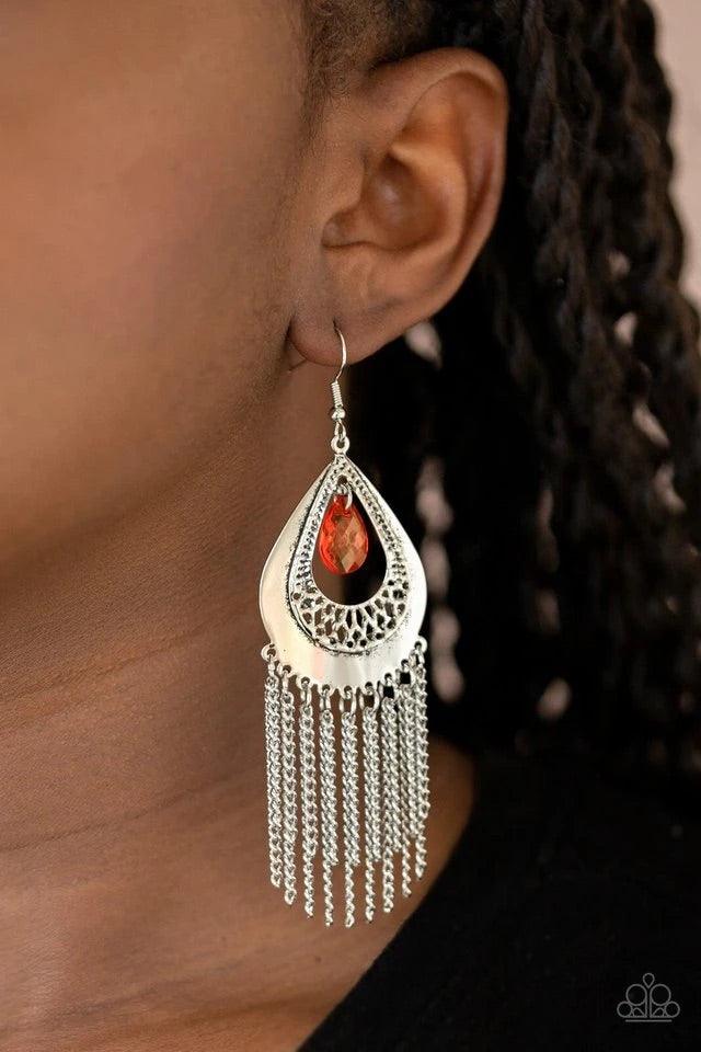 Paparazzi Accessories Scattered Storms - Red A faceted red teardrop dangles from the top of a decorative silver teardrop frame featuring stenciled and hammered details. Dainty silver chains stream from the bottom, adding a classic fringe to the refined di