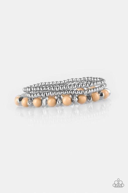 Paparazzi Accessories Epic Escape - Brown Polished brown beads and mismatched silver beads are threaded along stretchy bands for a seasonal look. Jewelry