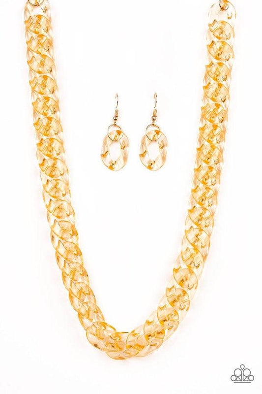 Paparazzi Accessories Put It On Ice - Gold Glassy gold links connect below the collar for a bold statement-making look. Features an adjustable clasp closure. Jewelry