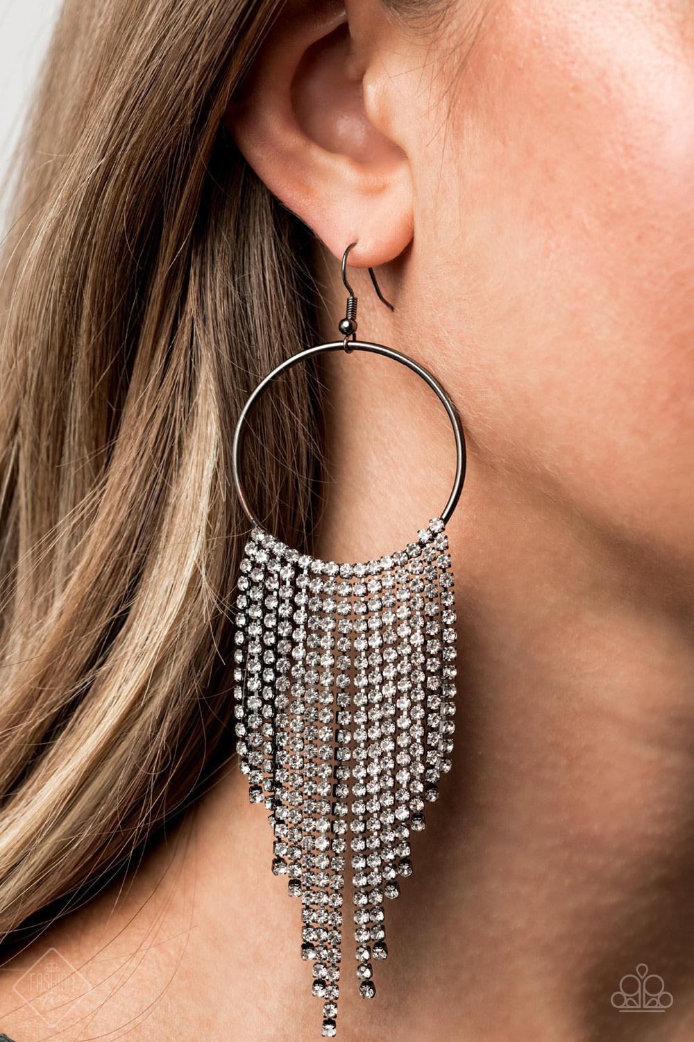 Paparazzi Accessories Streamlined Shimmer - Black Tapered rows of glittery white rhinestones cascade from the bottom of a shiny gunmetal hoop, creating a glamorously glitzy fringe. Earring attaches to a standard fishhook fitting. Sold as one pair of earri