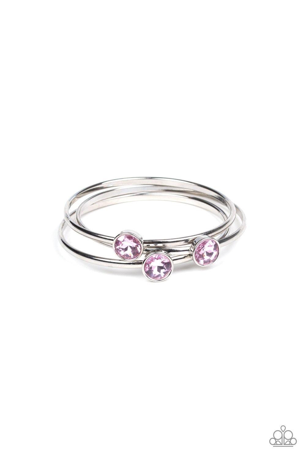 Paparazzi Accessories Be All You Can BEDAZZLE - Pink Encased in sleek silver frames, dazzling pink gems sit atop thick silver bangles for a refined flair. Sold as one set of three bracelets. Jewelry