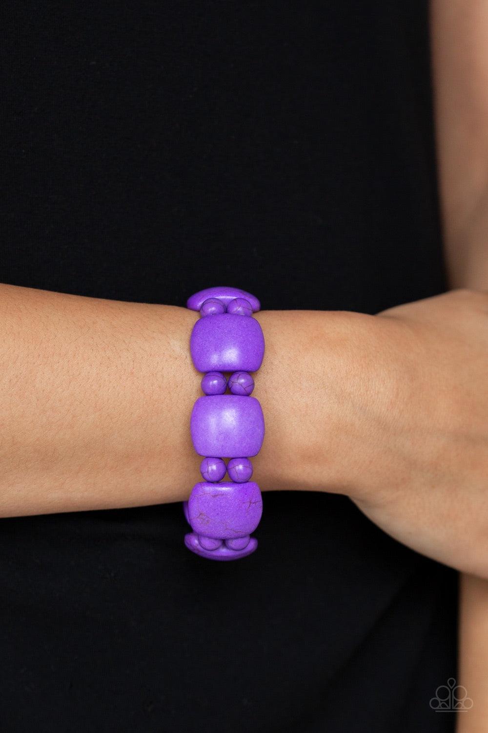 Paparazzi Accessories Don’t Be So NOMADIC! - Purple A collection of round and square-like purple stones are threaded along stretchy bands around the wrist for a seasonal look. Jewelry