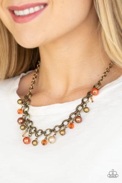 Paparazzi Accessories Fiercely Fancy - Multi Featuring pearly and glassy finishes, an array of brass, brown, and orange beads swing from a double-linked brass chain, creating a fancy fringe below the collar. Features an adjustable clasp closure. Sold as o