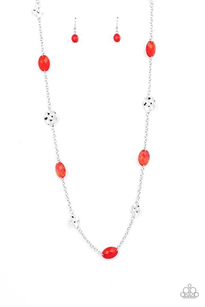 Paparazzi Accessories Glossy Glamorous - Red Featuring glassy, polished, and opaque finishes, a faceted collection of red beads join hammered silver discs along a shiny silver chain, creating a colorful display across the chest. Features an adjustable cla