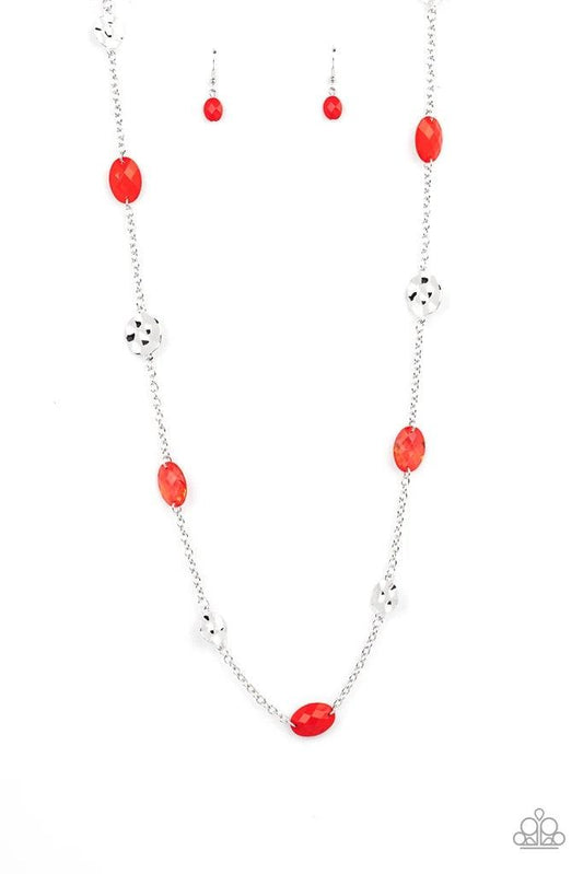 Paparazzi Accessories Glossy Glamorous - Red Featuring glassy, polished, and opaque finishes, a faceted collection of red beads join hammered silver discs along a shiny silver chain, creating a colorful display across the chest. Features an adjustable cla