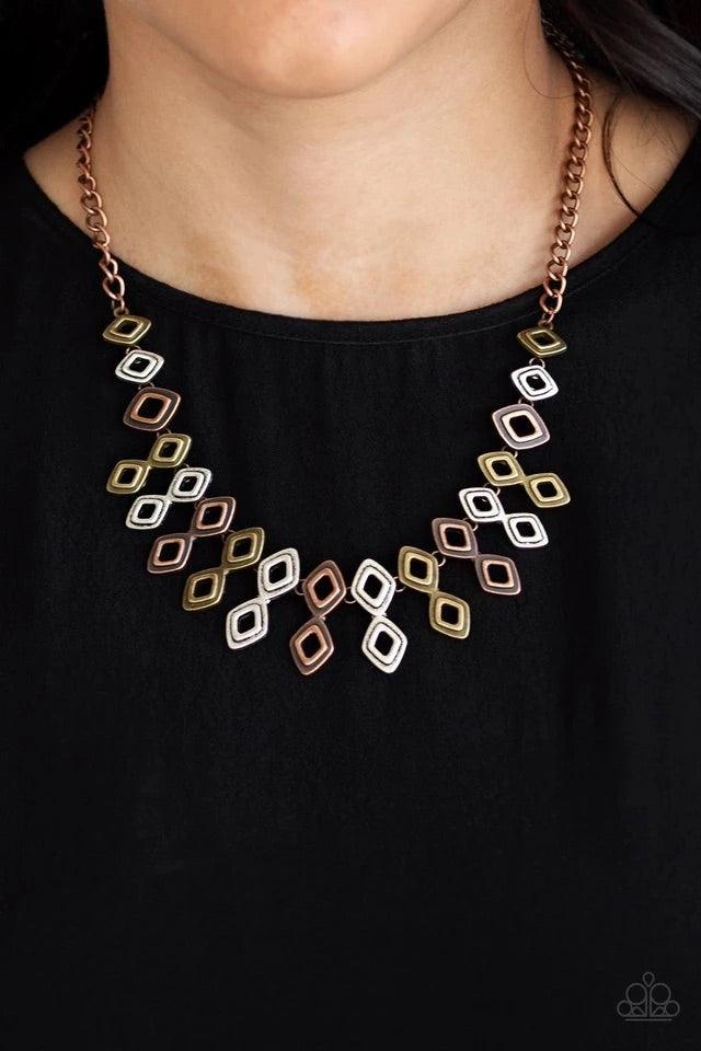 Paparazzi Accessories Geocentric - Multi Brushed in an antiqued shimmer, glistening diamond-shaped copper, brass, and silver frames link below the collar, coalescing into an edgy geometric fringe. Features an adjustable clasp closure.Sold as one individua