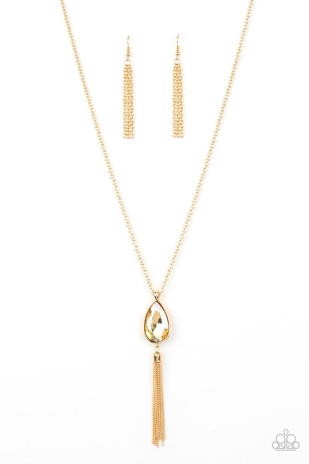 Paparazzi Accessories Elite Shine - Gold A golden teardrop gem swings from the bottom of a lengthened gold chain for a dramatic look. A shimmery gold chain tassel swings from the bottom of the pendant for a glamorous finish. Features an adjustable clasp c