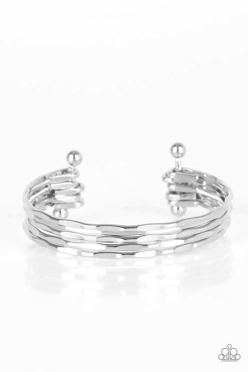 Paparazzi Accessories Street Refinement ~Silver Delicately hammered in sections of shimmer, glistening silver bars are threaded along two metallic rods, creating a layered cuff across the wrist. Sold as one individual bracelet. Jewelry