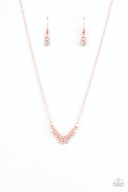 Paparazzi Accessories Classically Classic - Copper Encrusted in glassy white rhinestones, a dainty shiny copper pendant delicately bows below the collar in a timeless fashion. Features an adjustable clasp closure. Jewelry