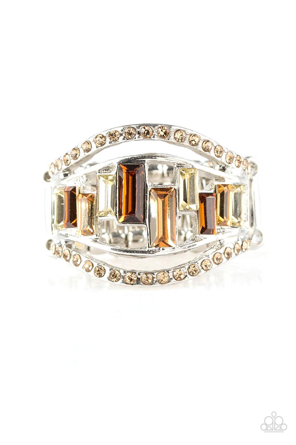 Paparazzi Accessories Treasure Chest Charm - Brown Topaz rhinestone encrusted bands flank a row of emerald cut glass beads in shades of brown and white for a regal look. Features a stretchy band for a flexible fit. Jewelry