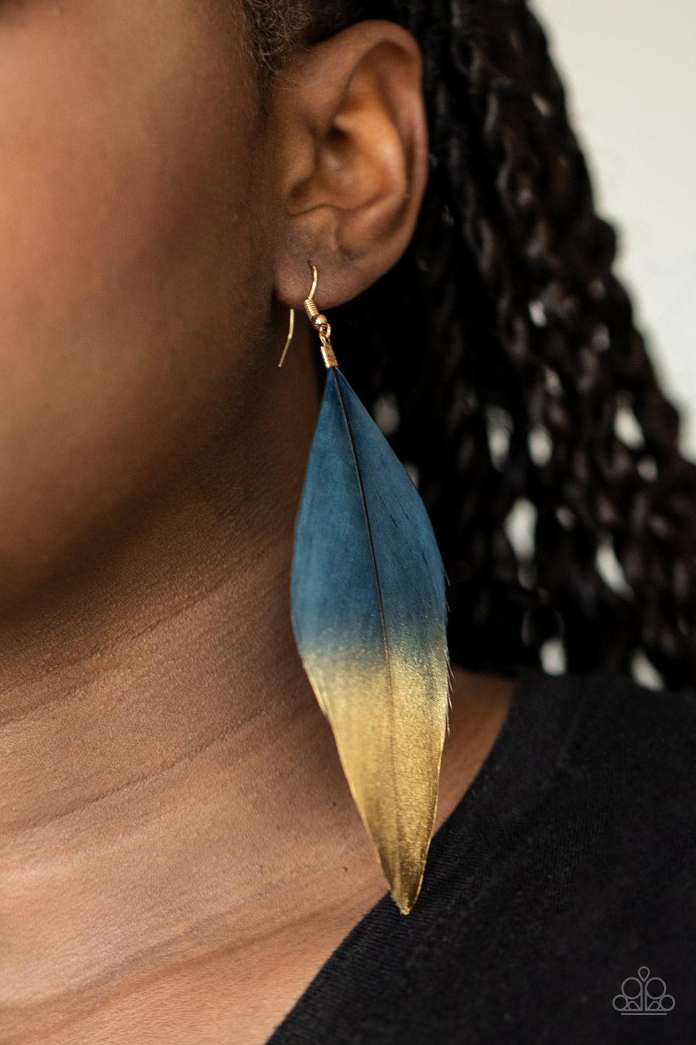 Paparazzi Accessories Fleek Feathers - Blue Dipped in a golden shimmer, a soft blue feather fans from the ear in a statement-making fashion. Earring attaches to a standard fishhook fitting. Sold as one pair of earrings. Jewelry