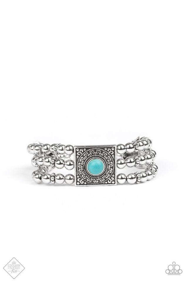 Paparazzi Accessories Solstice Soul - Blue Infused with ornate silver frames, strands of shiny silver beads and studded silver accents are threaded along invisible wires across the wrist. Dotted with a refreshing turquoise stone, a filigree-filled square