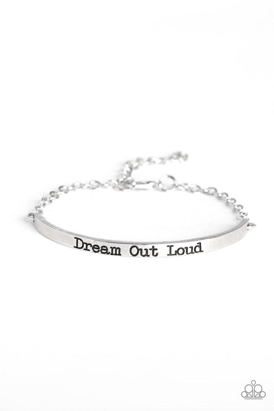 Paparazzi Accessories Dream Out Loud - Silver A glistening silver chain attaches to a dainty silver bar stamped in the inspirational phrase, "Dream Out Loud", for a dreamy finish. Features an adjustable clasp closure. Jewelry