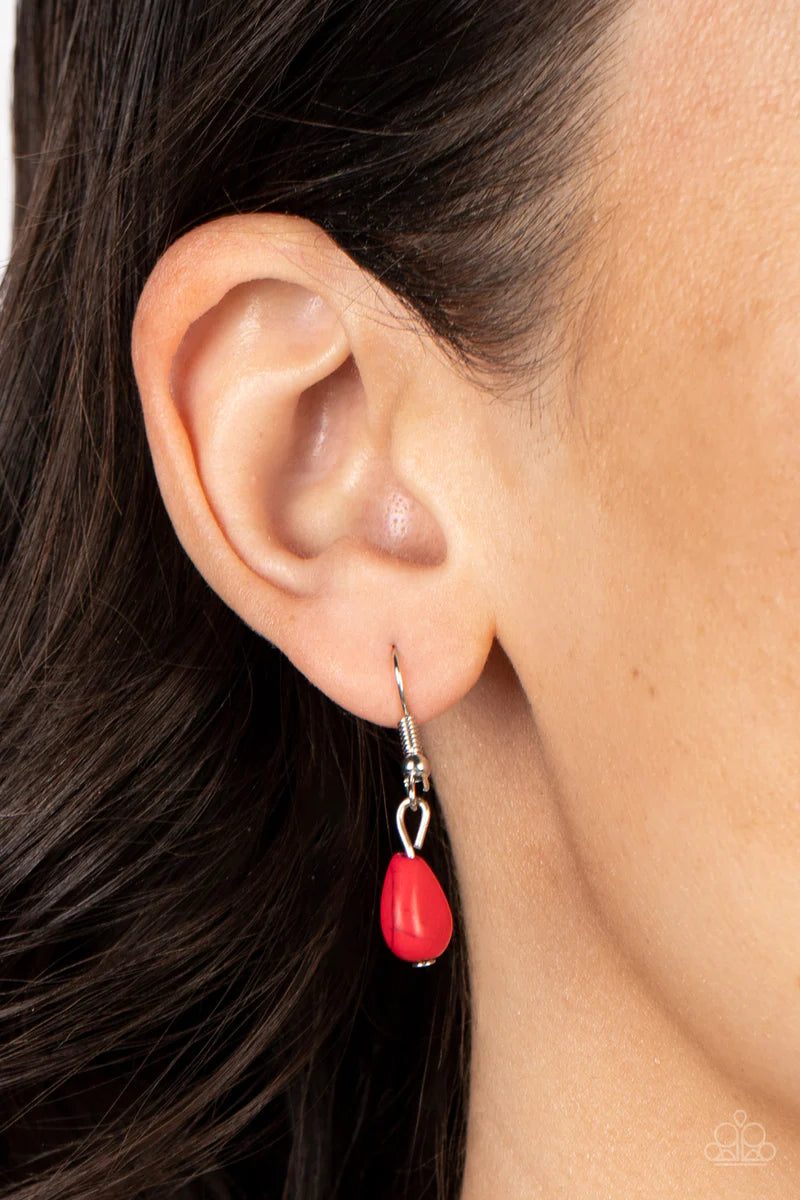 Paparazzi Accessories Saguaro Soul Trek - Red Bordered in studded and spun silver textures, shiny silver teardrops alternate with red stone frames at the bottom of a silver chain. Bordered in whirls of studded details, an oversized red teardrop stone is p