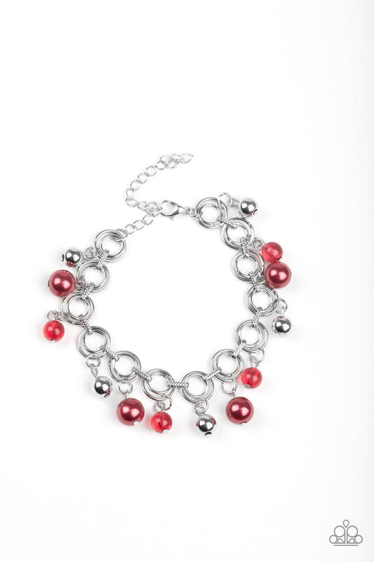 Paparazzi Accessories Fancy Fascination - Red Featuring pearly and glassy finishes, an array of silver and red beads swing from a double-linked silver chain, creating a fancy fringe around the wrist. Features an adjustable clasp closure. Sold as one indiv