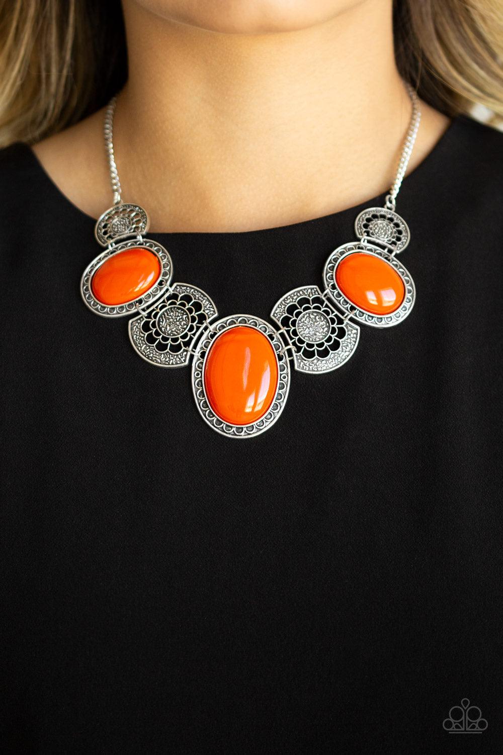 Paparazzi Accessories The Medallion-aire - Orange Flat orange beads connect with shimmery silver floral frames below the collar, creating a colorful medallion-like statement piece with a vintage inflection. Features an adjustable clasp closure. Jewelry