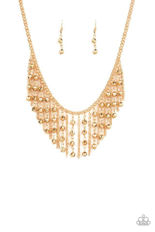 Paparazzi Accessories Rebel Remix - Gold Stands of faceted gold beads and glistening gold chains stream from a matching gold chain, creating an edgy fringe below the collar. Features an adjustable clasp closure. Sold as one individual necklace. Includes o