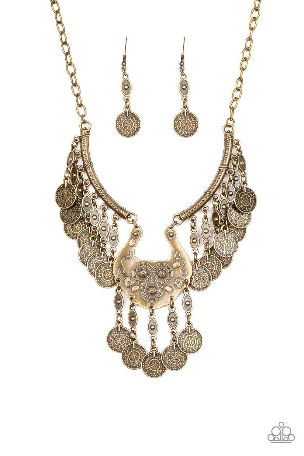 Paparazzi Accessories Treasure Temptress - Brass Brass coin-like accents dangle from the bottom of three ornate brass plates, creating a noise-making fringe below the collar. Features an adjustable clasp closure. Jewelry