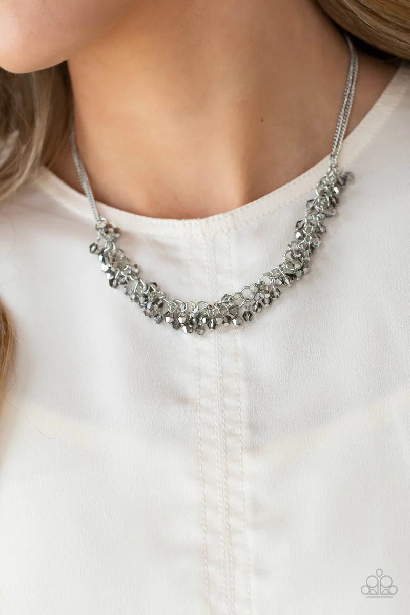 Paparazzi Accessories Let There Be TWILIGHT - Silver Flecked in hematite, dainty smoky crystal-like beads swing from doubled silver chains, creating a clustered fringe below the collar. Features an adjustable clasp closure. Sold as one individual necklace