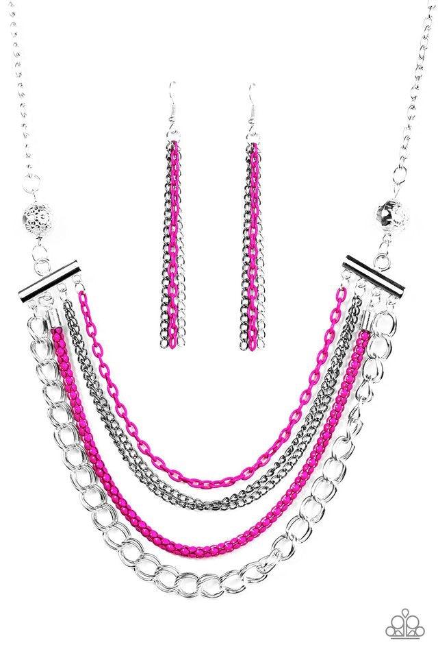 Paparazzi Accessories High-Intensity - Pink Two floral silver beads give way to an array of pink, gunmetal, and silver chains. Strung between two metal beads, the mismatched chains layer below the collar in a colorfully industrial fashion. Features an adj