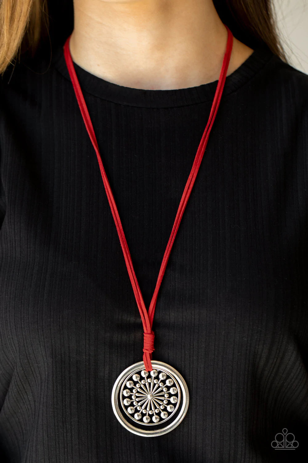 Paparazzi Accessories One MANDALA Show - Red A lengthened piece of red suede cording is knotted around a silver ring and a decorative studded silver frame, creating a whimsy mandala-like pendant. Features an adjustable clasp closure. Sold as one individua