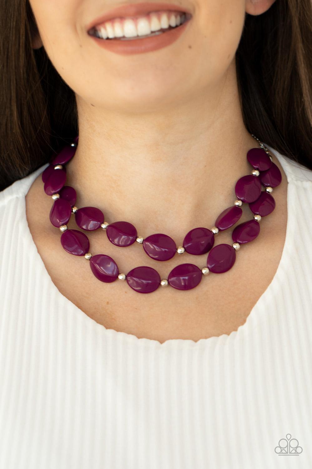 Paparazzi Accessories Two-Story Stunner ~Purple Two rows of dainty silver beads and faceted Magenta Purple faux stone beads alternate along invisible wires below the collar, creating bold, colorful layers. Features an adjustable clasp closure. Sold as one