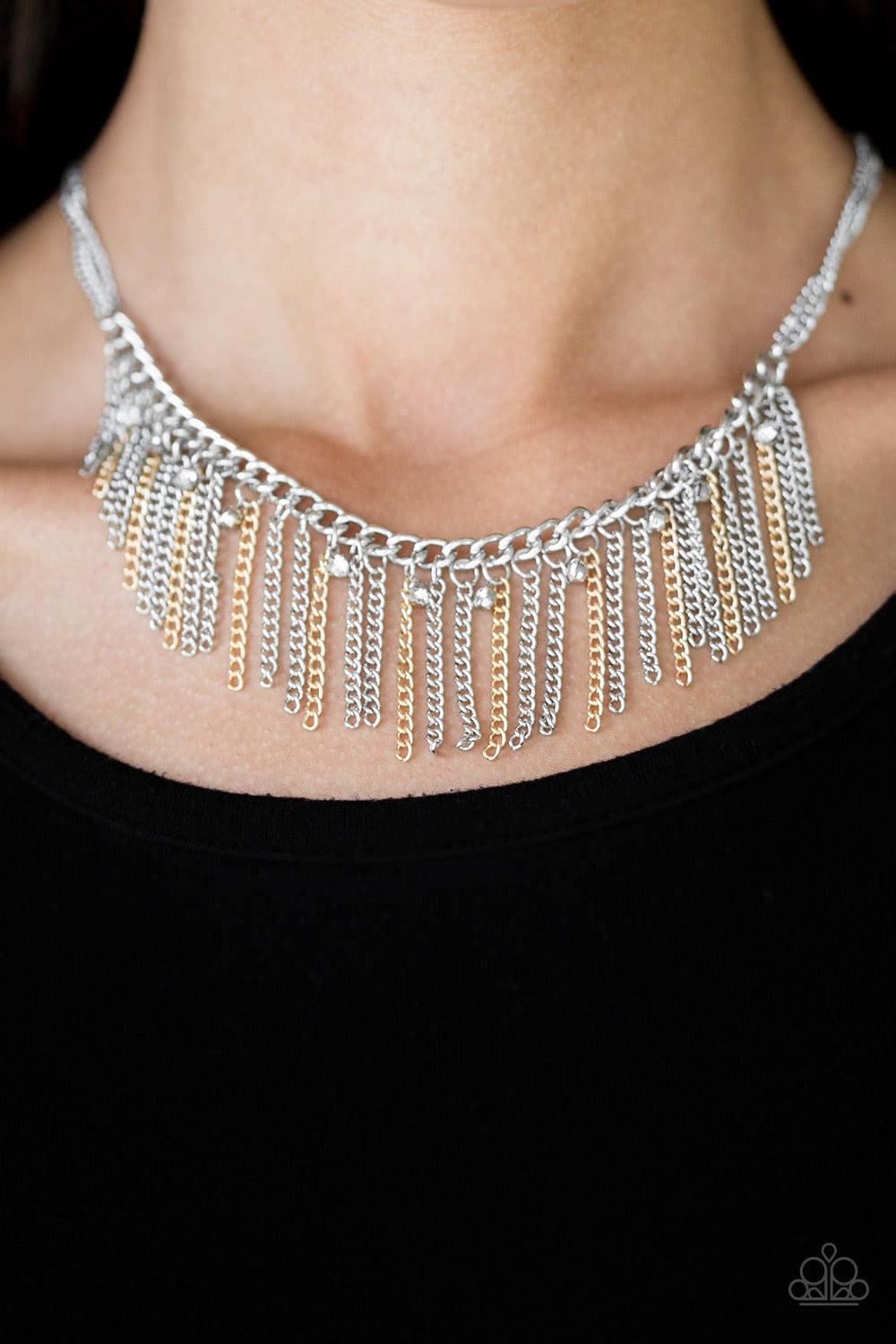 Paparazzi Accessories Retro Edge - Multi Shiny gold and glistening silver chains stream from the bottom of a bold silver chain, creating a colorful fringe below the collar. White rhinestones drip between the free-falling chains, adding an edgy shimmer to