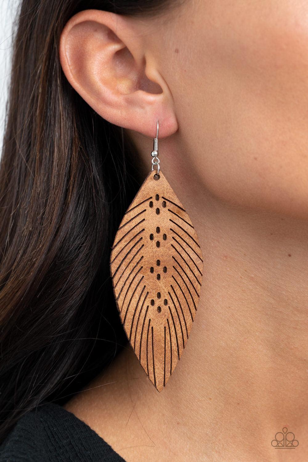 Paparazzi Accessories Wherever the Wind Takes Me - Brown Spliced and stenciled in whimsical detail, a distressed leather frame is cuter into a feathery frame for a free-spirited finish. Earring attaches to a standard fishhook fitting. Sold as one pair of