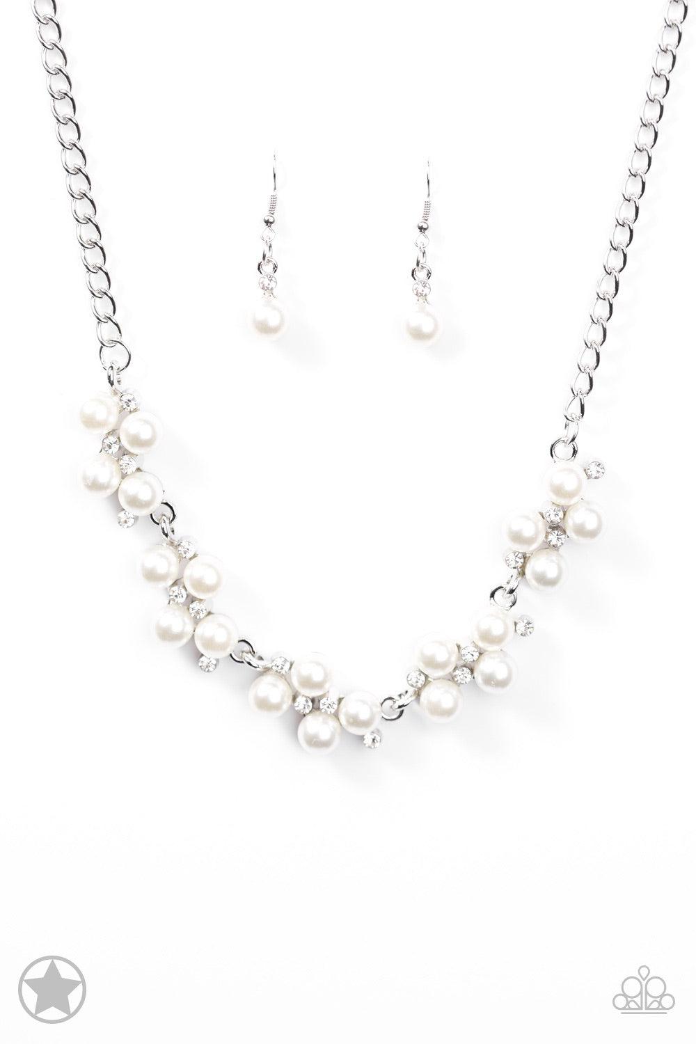 Paparazzi Accessories Love Story - White Dainty clusters of shimmery white pearls are dusted with sparkling rhinestones, creating a romantic, timeless design. Features an adjustable clasp closure. Jewelry