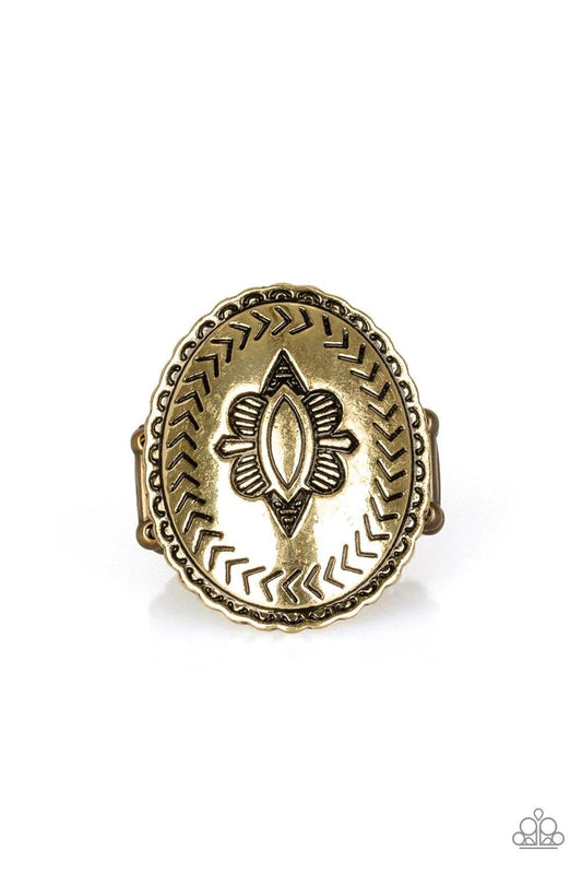 Paparazzi Accessories Down and OUTBACK - Brass Stamped in tribal inspired patterns, a textured brass frame features a decorative floral center for an artisan inspired style. Features a stretchy band for a flexible fit. Sold as one individual ring. Jewelry