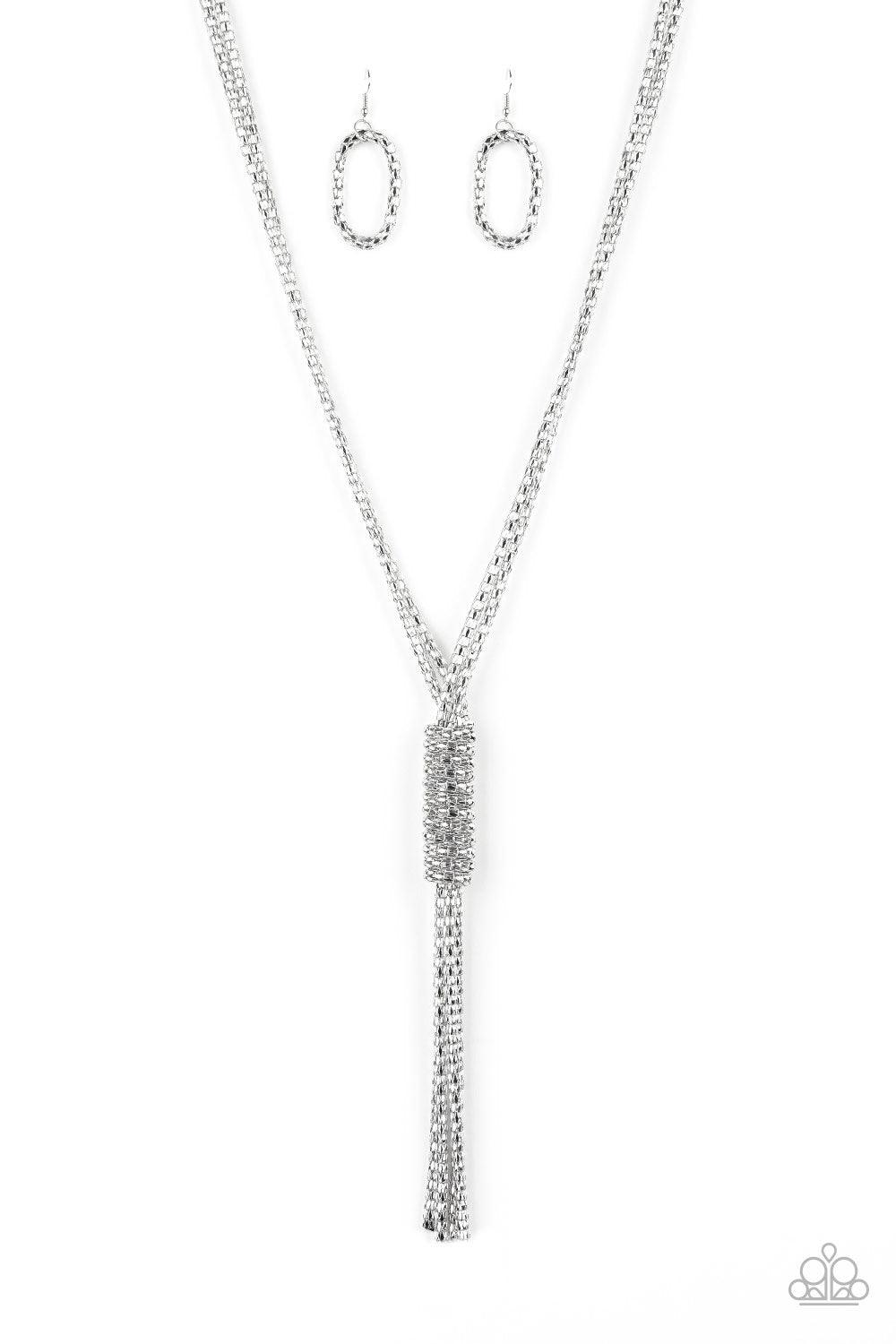 Paparazzi Accessories Boom Boom Knockout - Silver Shimmery strands of silver popcorn chain dramatically fall down the chest. An additional chain wraps around the cascading strands, creating a bold central pendant with shimmering tassels. Jewelry