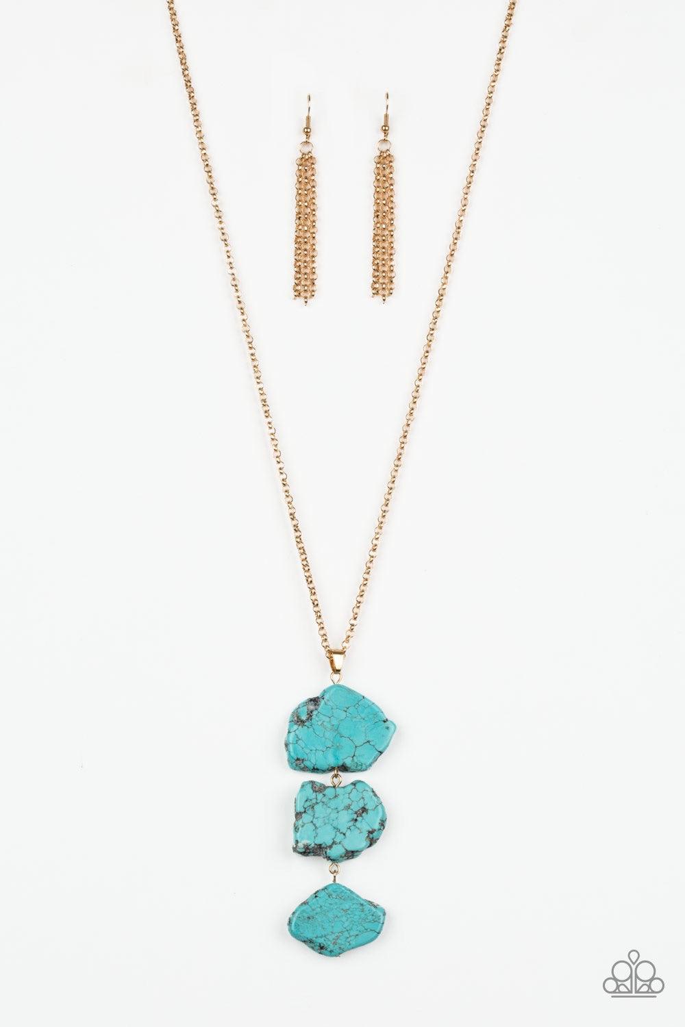 Paparazzi Accessories On The ROAM Again - Gold As if chipped off a cliff, pieces of turquoise rock link at the bottom of a lengthened gold chain for an earthy look. As the stone elements in this piece are natural, some color variation is normal. Features