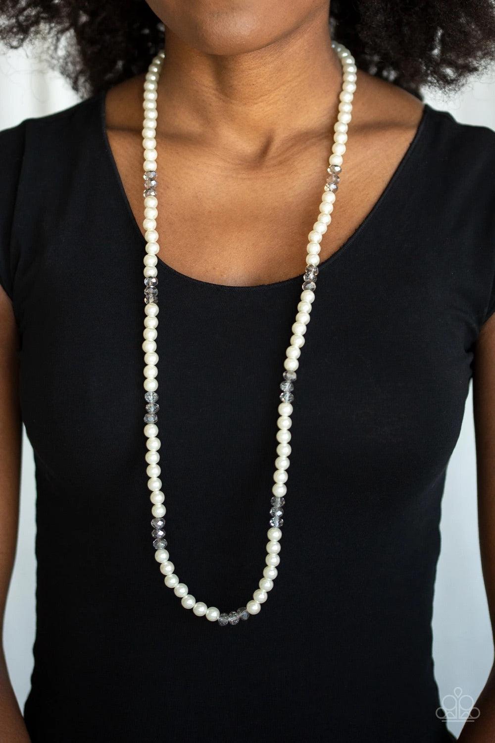 Paparazzi Accessories Girls Have More FUNDS - White Infused with sections of smoky crystal-like beads, a timeless collection of white pearls are threaded along an invisible wire across the chest for a refined flair. Features an adjustable clasp closure. S