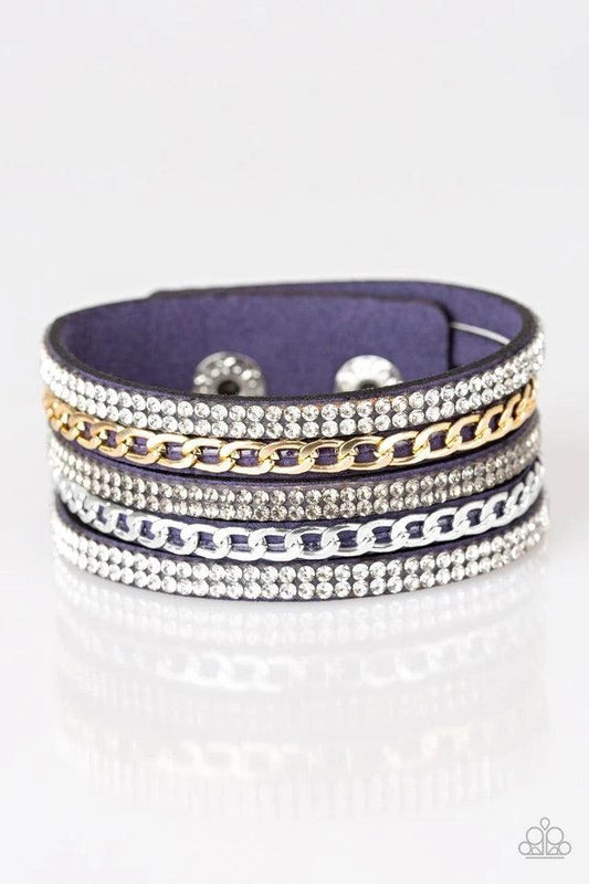 Paparazzi Accessories Fashion Fiend - Blue Glassy white and smoky rhinestones are encrusted along strands of blue suede. Glistening silver and gold chains are added to the bands, adding edgy industrial shimmer to the sassy palette. Features an adjustable