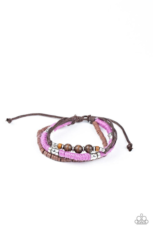 Paparazzi Accessories Totally Tiki - Purple Infused with wooden and silver accents, mismatched strands of purple twine and brown cording layer around the wrist for a colorfully seasonal look. Features an adjustable sliding knot closure. Sold as one indivi