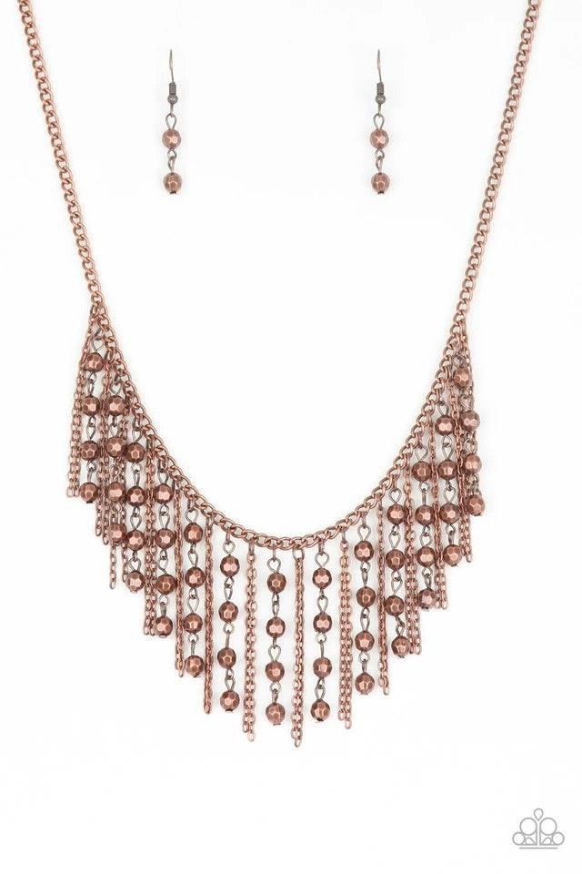 Paparazzi Accessories Rebel Remix - Copper Strands of faceted copper beads and glistening copper chains stream from a matching copper chain, creating an edgy fringe below the collar. Features an adjustable clasp closure. Sold as one individual necklace. I