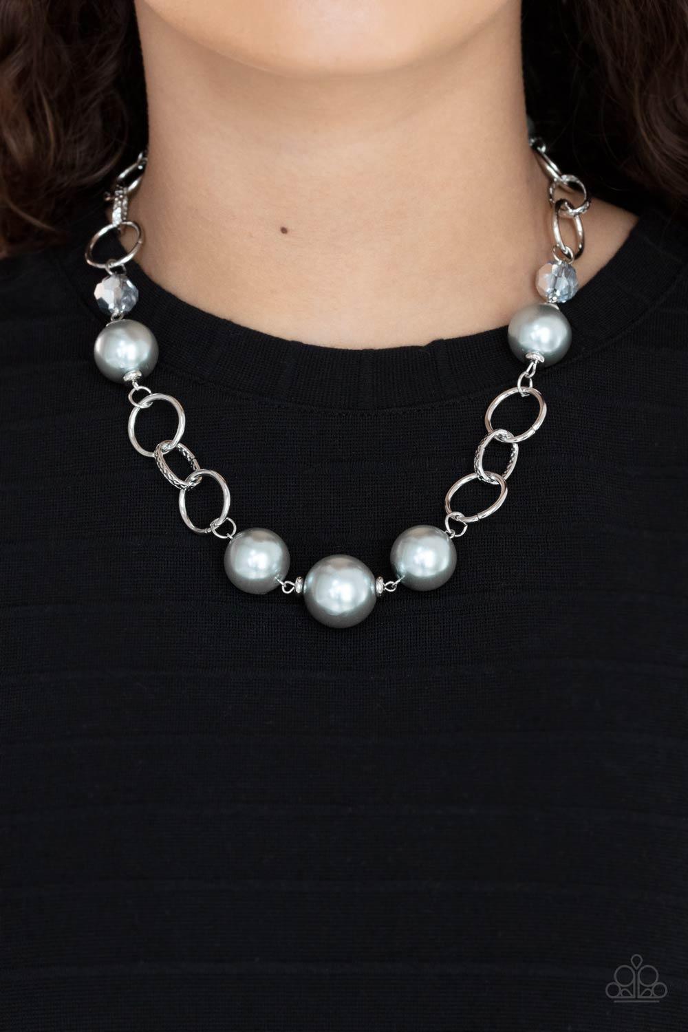 Paparazzi Accessories New Age Novelty - Silver Sections of bold silver links, oversized silver pearls, and , metallic flecked crystal-like beads haphazardly connect below the collar, creating a dramatic display. Features an adjustable clasp closure. Sold