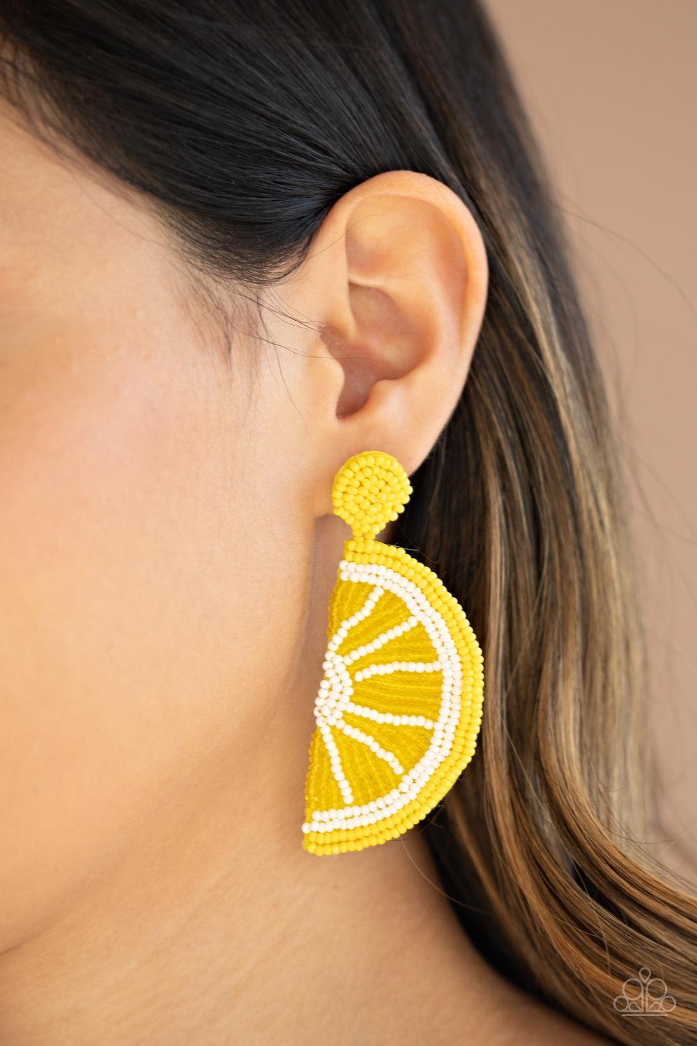 Paparazzi Accessories When Life Gives You Lemons ~Yellow Dainty yellow, white, and crystal-like yellow beads adorn the front of a felt yellow frame, creating a juicy lemon slice. Earring attaches to a standard post fitting.