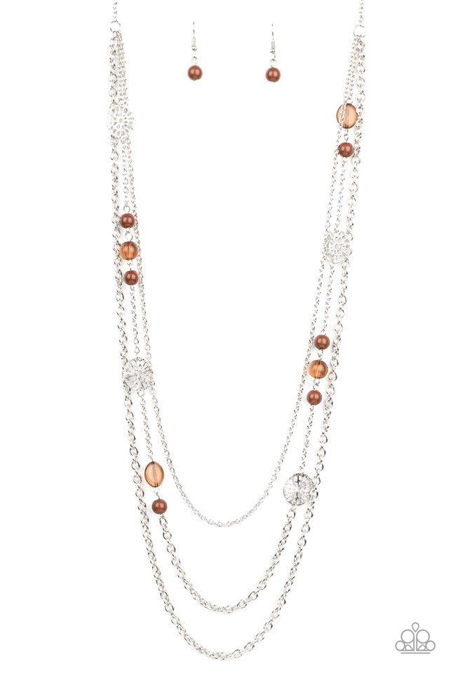 Paparazzi Accessories Pretty Pop-tastic! - Brown Ornate silver accents, glassy beads, and polished brown beads trickle along strands of shimmery silver chains for a whimsical look. Features an adjustable clasp closure. Sold as one individual necklace. Inc