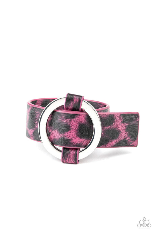 Paparazzi Accessories Jungle Cat Couture - Pink Featuring a shiny pink cheetah pattern, a textured piece of leather loops through the center of a shimmery silver hoop for a sassy urban look. Features an adjustable belt loop closure. Jewelry