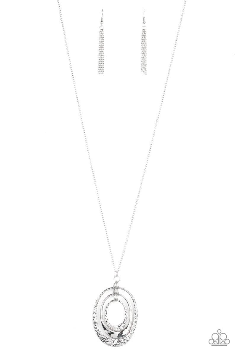 Paparazzi Accessories Dizzying Decor - Silver Flaring out at the bottoms, a trio of smooth and hammered silver frames drip from the bottom of a lengthened silver chain, creating a casually stacked pendant. Features an adjustable clasp closure. Sold as one
