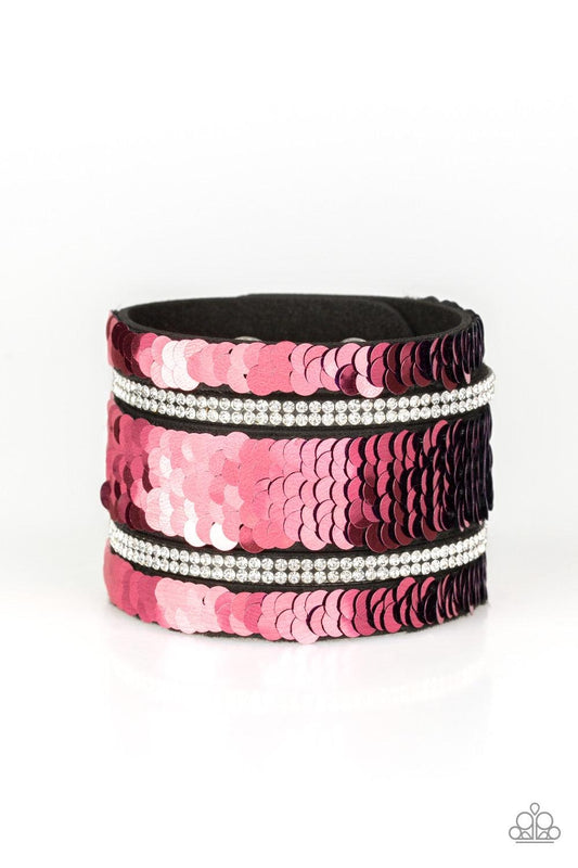 Paparazzi Accessories MERMAID Service - Pink Infused with strands of blinding white rhinestones, row after row of shimmery sequins are stitched across the front of a spliced black suede band. Bracelet features reversible sequins that change from blue to p