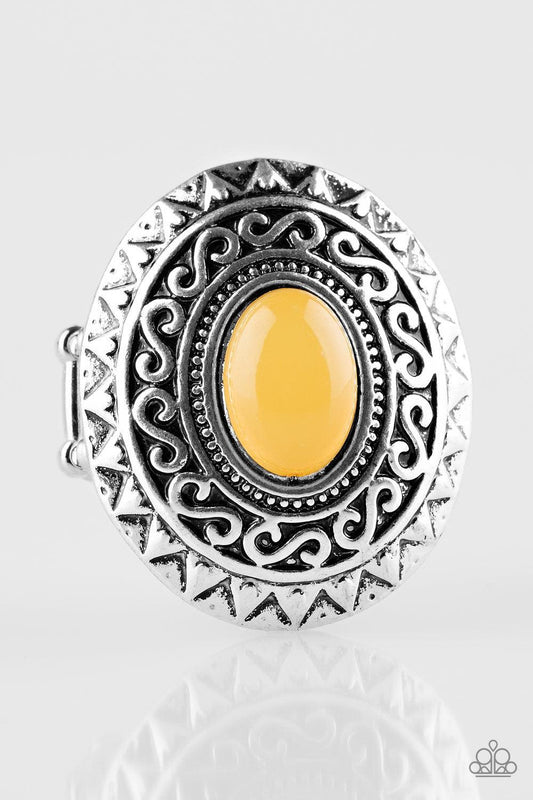 Paparazzi Accessories Hello, Sunshine - Yellow A glowing yellow stone is pressed in the center of a dramatic silver frame radiating with shimmery sunburst details for a seasonal look. Features a stretchy band for a flexible fit. Sold as one individual rin