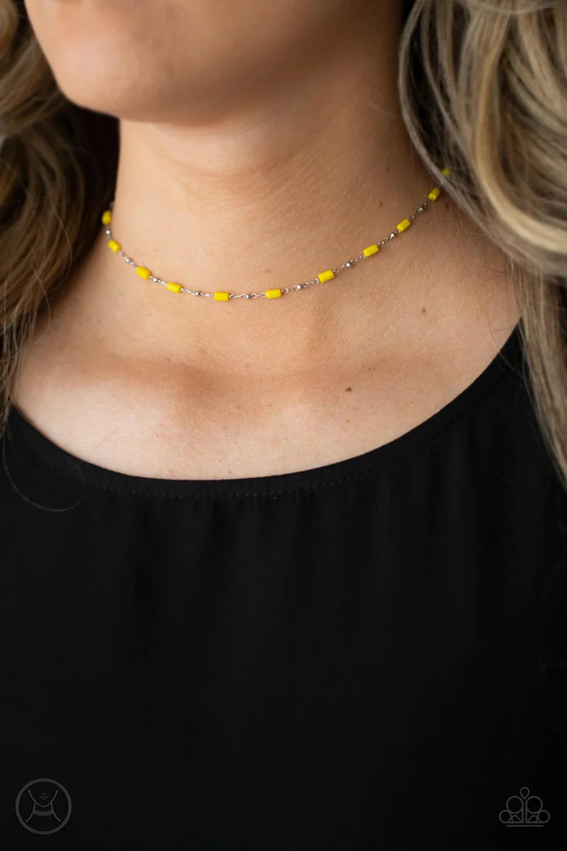 Paparazzi Accessories Urban Expo - Yellow Dainty silver beads and cylindrical Illuminating beads delicately link around the neck, creating a minimalist inspired pop of color. Features an adjustable clasp closure. Sold as one individual choker necklace. In