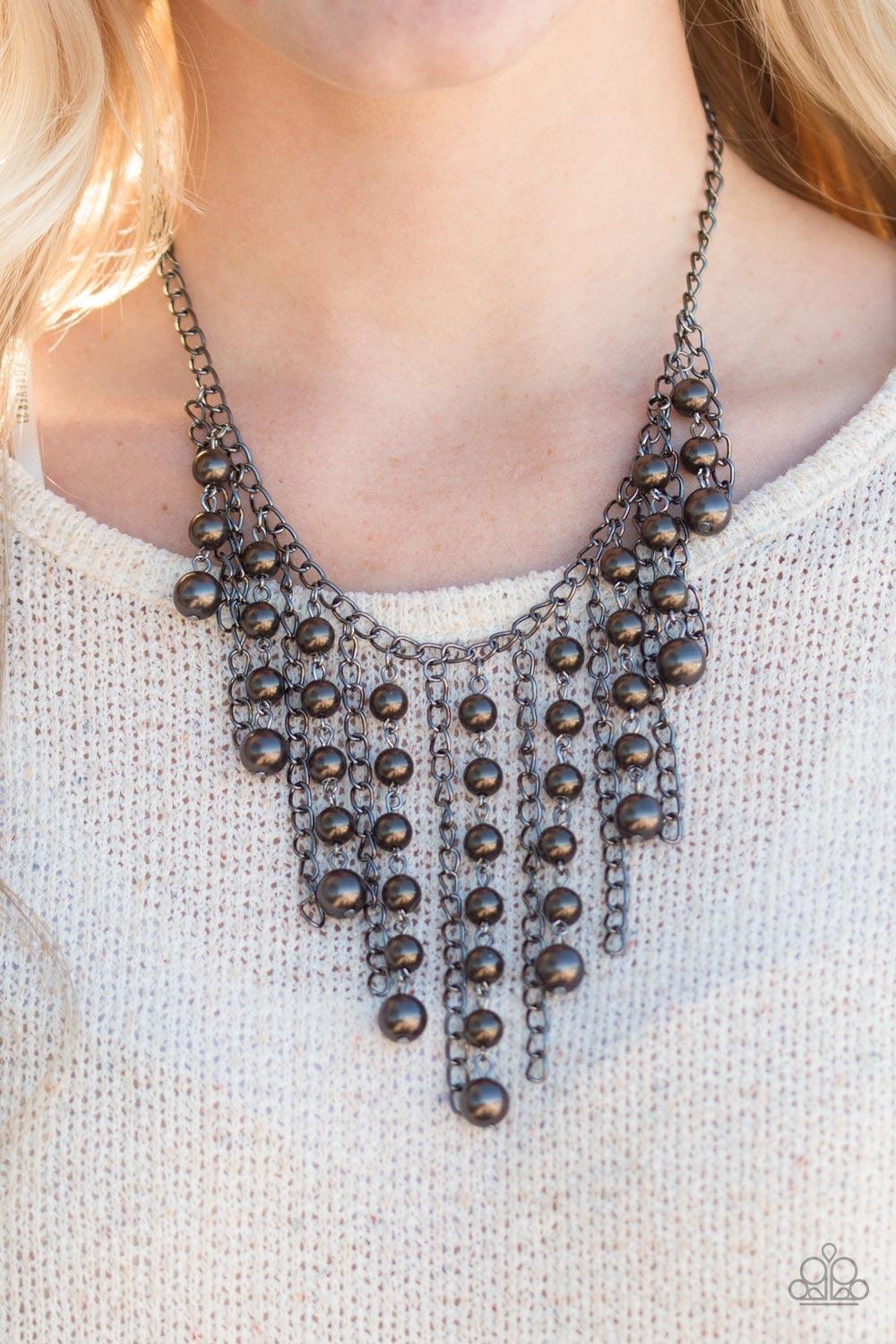 Paparazzi Accessories STUN Control - Black Pearly gunmetal beads trickle along strands of glistening gunmetal chains, creating a tapered fringe below the collar. Features an adjustable clasp closure. Jewelry