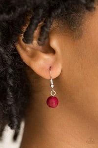 Paparazzi Accessories Pacific Piers - Red Featuring round and teardrop shapes, rich red beading trickles along an elongated silver chain for a seasonal look. Features an adjustable clasp closure. Jewelry
