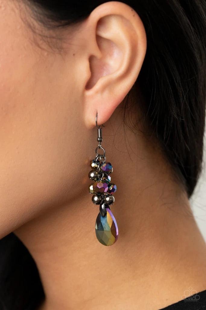 Paparazzi Accessories Before and AFTERGLOW - Multi An array of metallic oil spill crystal-like beads and shiny gunmetal beads trickles along a lengthened gunmetal chain, giving way to a matching oil spill crystal-like teardrop for a dramatic chandelier ef