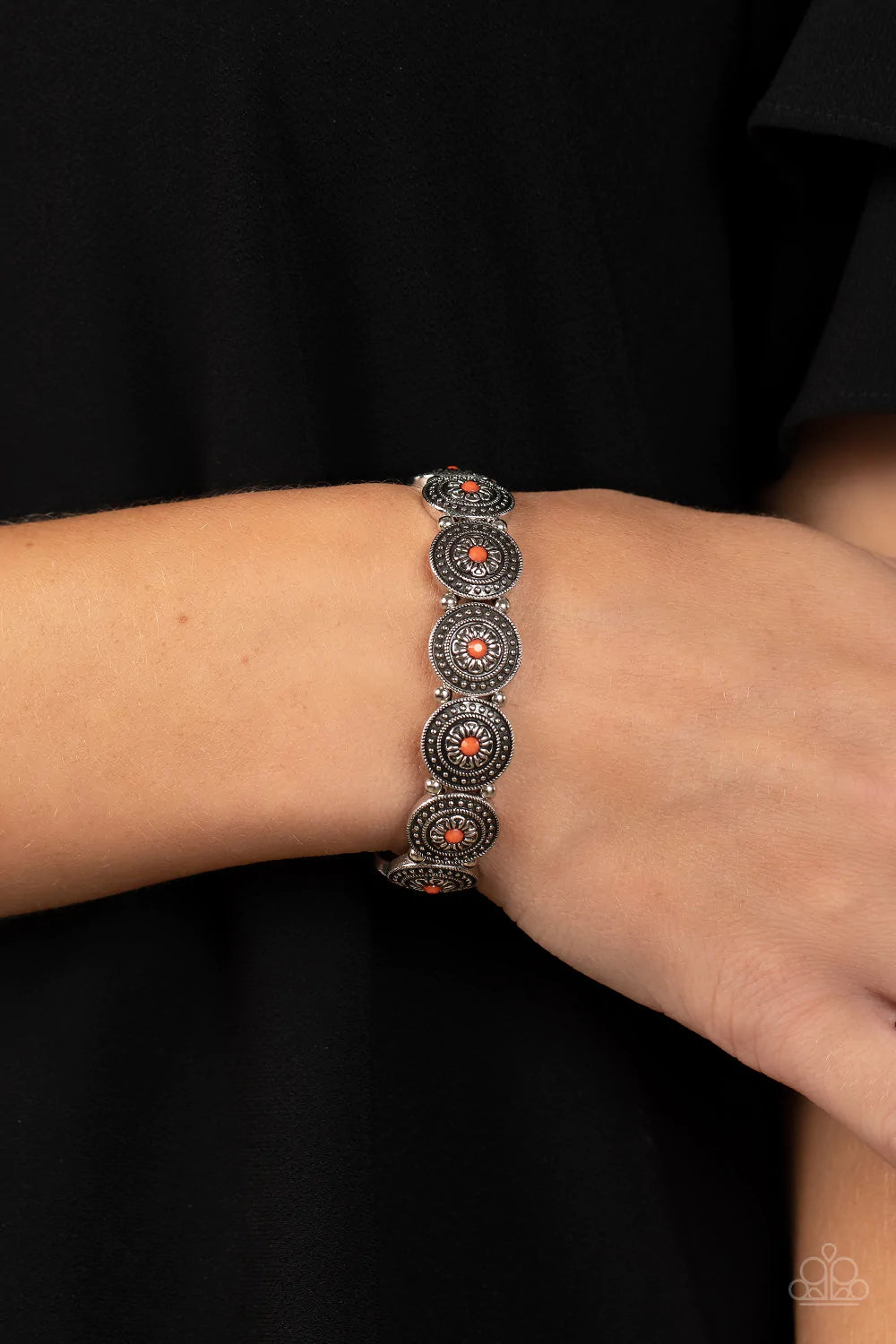 Paparazzi Accessories Granada Garden Party - Orange Dotted with faceted orange beaded centers, a studded collection of floral silver frames alternate with dainty silver beads along stretchy bands around the wrist for a whimsical pop of color. Sold as one