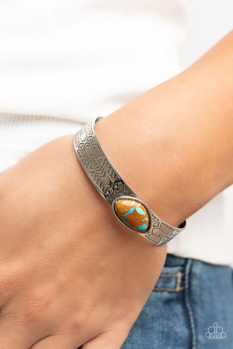 Paparazzi Accessories Gobi Glyphs - Brown Featuring a terrazzo finish, an asymmetrical brown stone is pressed into a silver cuff embossed in geometric texture for an artisanal finish. Sold as one individual bracelet. Jewelry
